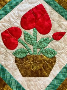 Applique Flowers on Quilt