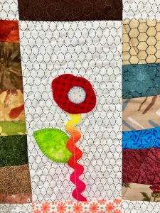 Hand applique quilt with Presencia