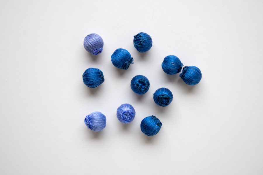 Blueberries made from thread-wrapped beads