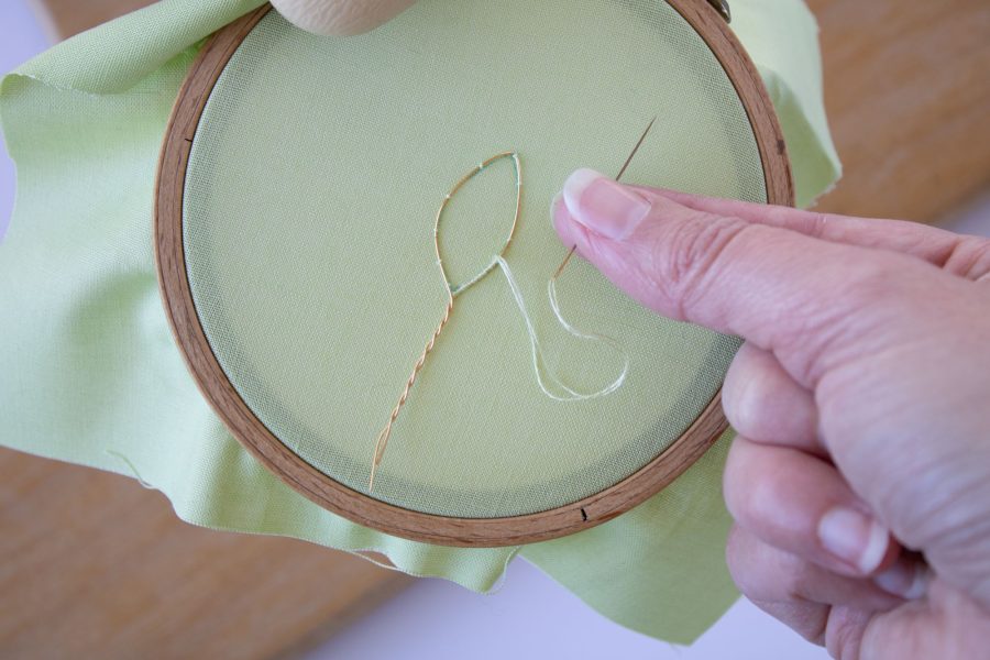 Embroidering over a wireslip leaf with a single strand of cotton thread and a size 10 embroidery needle