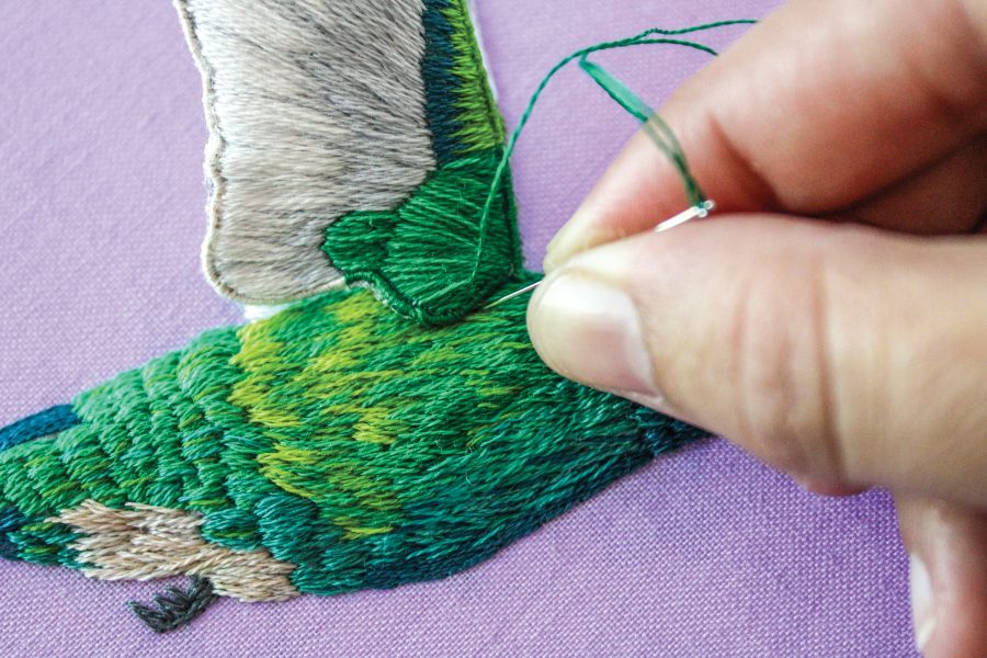 A thread painted hummingbird body.